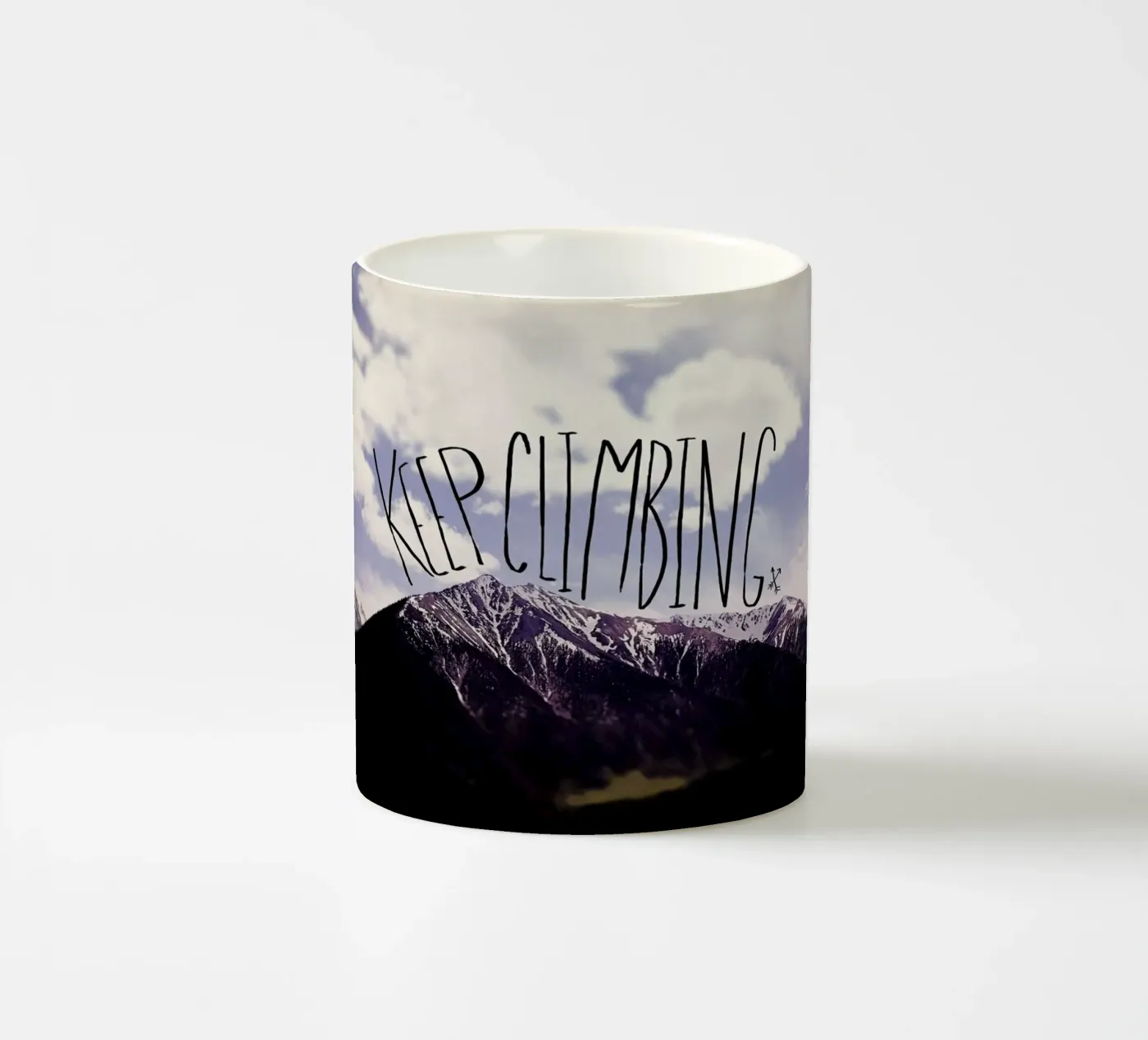 Keep climbing ceramic mug by Leah Flores