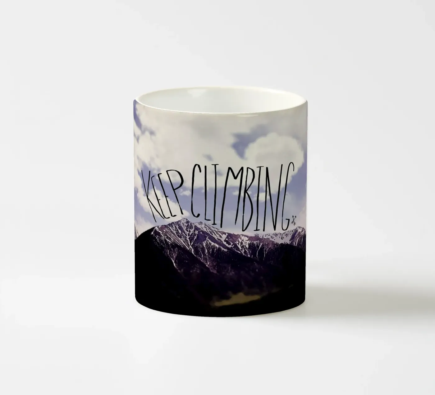Keep climbing ceramic mug by Leah Flores