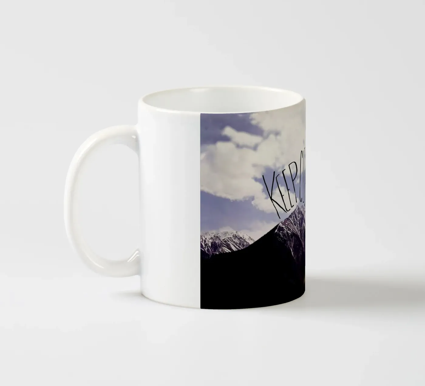 Keep climbing ceramic mug by Leah Flores
