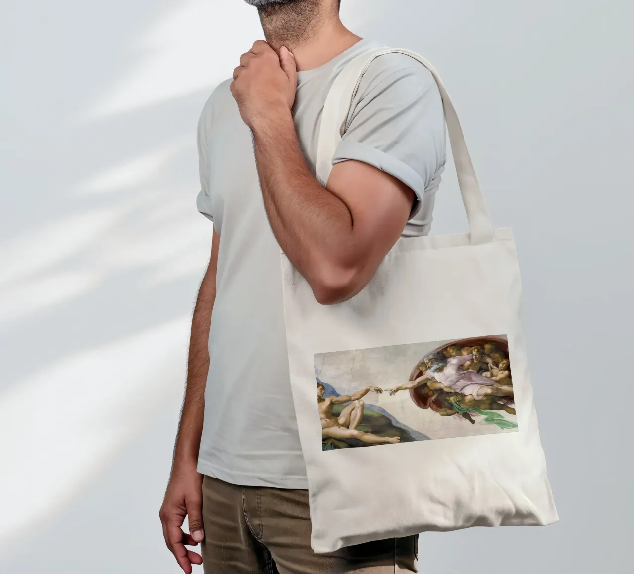 Michelangelo Buonarroti's The Creation of Adam borsa in juta da Venus Art