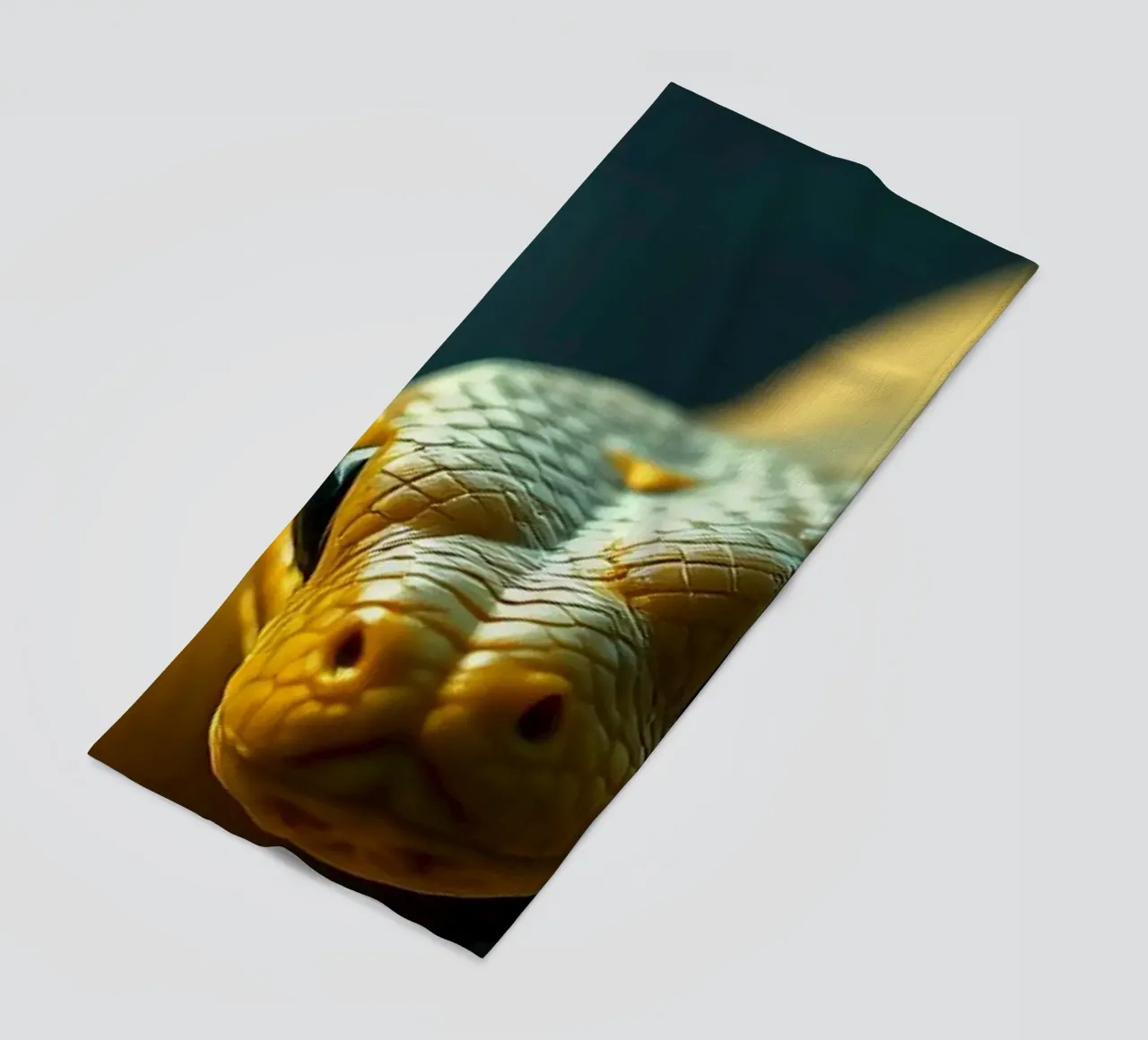 A beautifully coiled yellow snake resting on dark backgroud beach towel by DesignDoodle