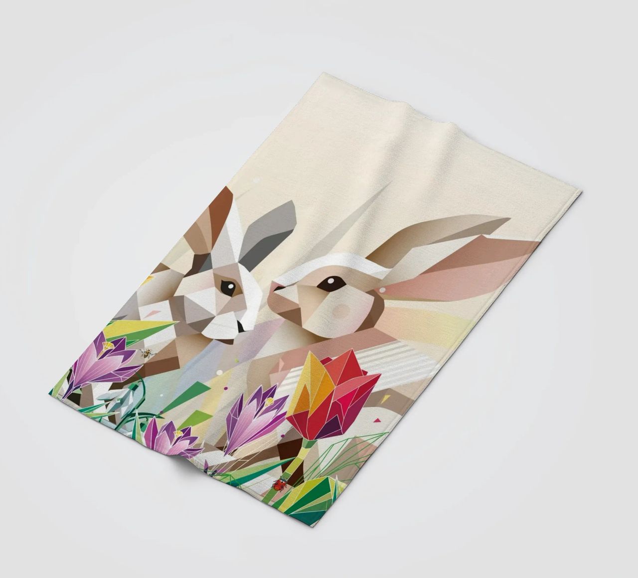 Due coniglietti di Pasqua in un mare di fiori coperta in pile da namosh