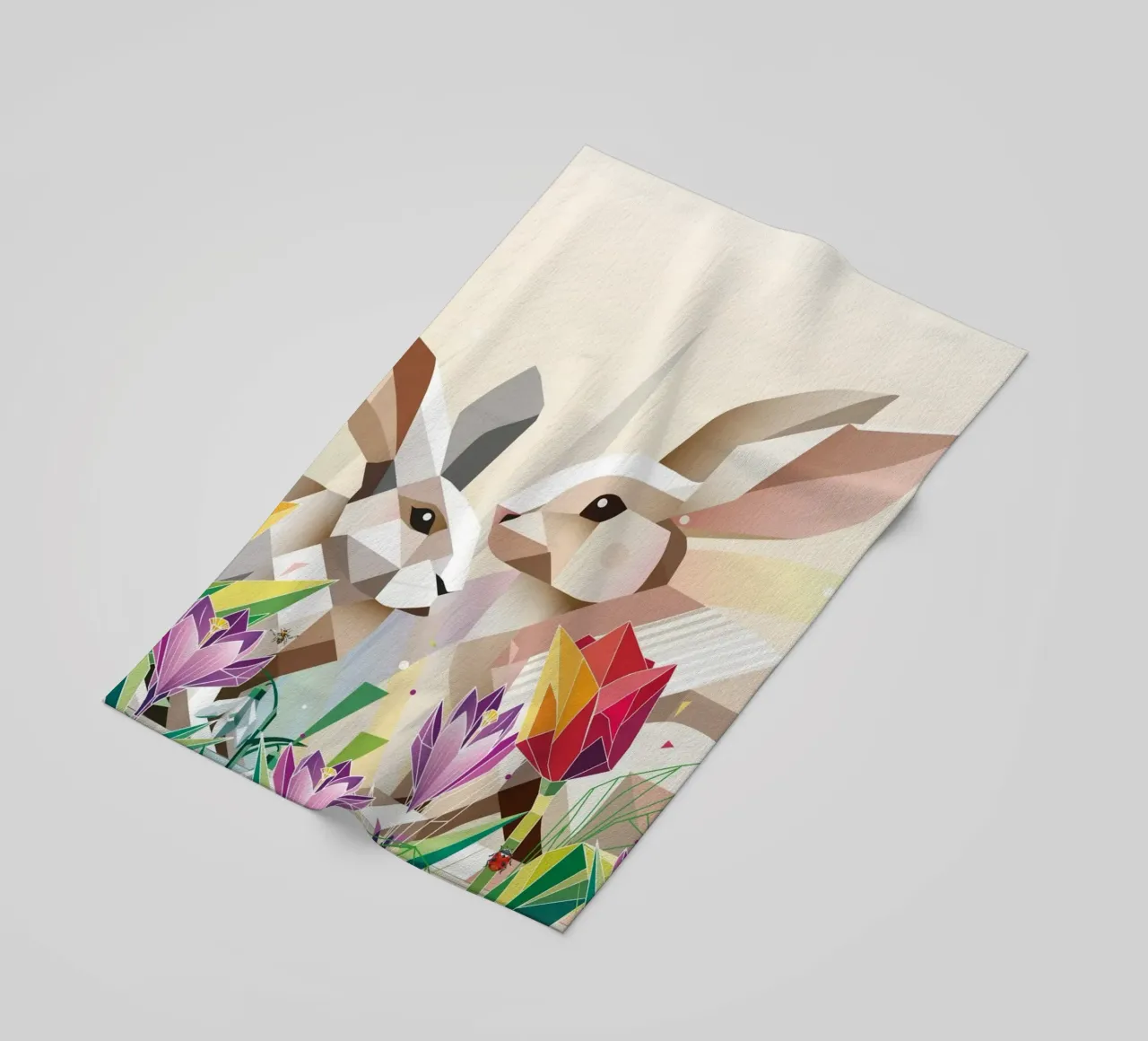 Two Easter bunnies in a sea of flowers beach towel by namosh