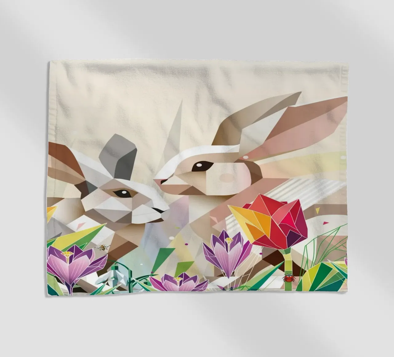 Due coniglietti di Pasqua in un mare di fiori telo mare da namosh