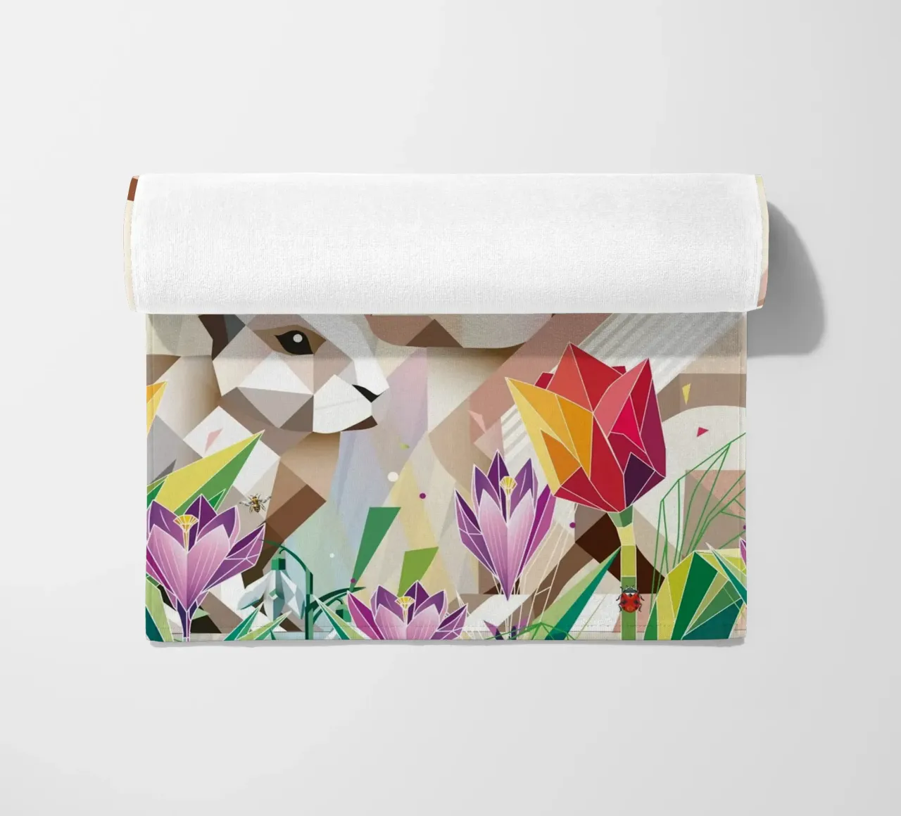 Due coniglietti di Pasqua in un mare di fiori telo mare da namosh