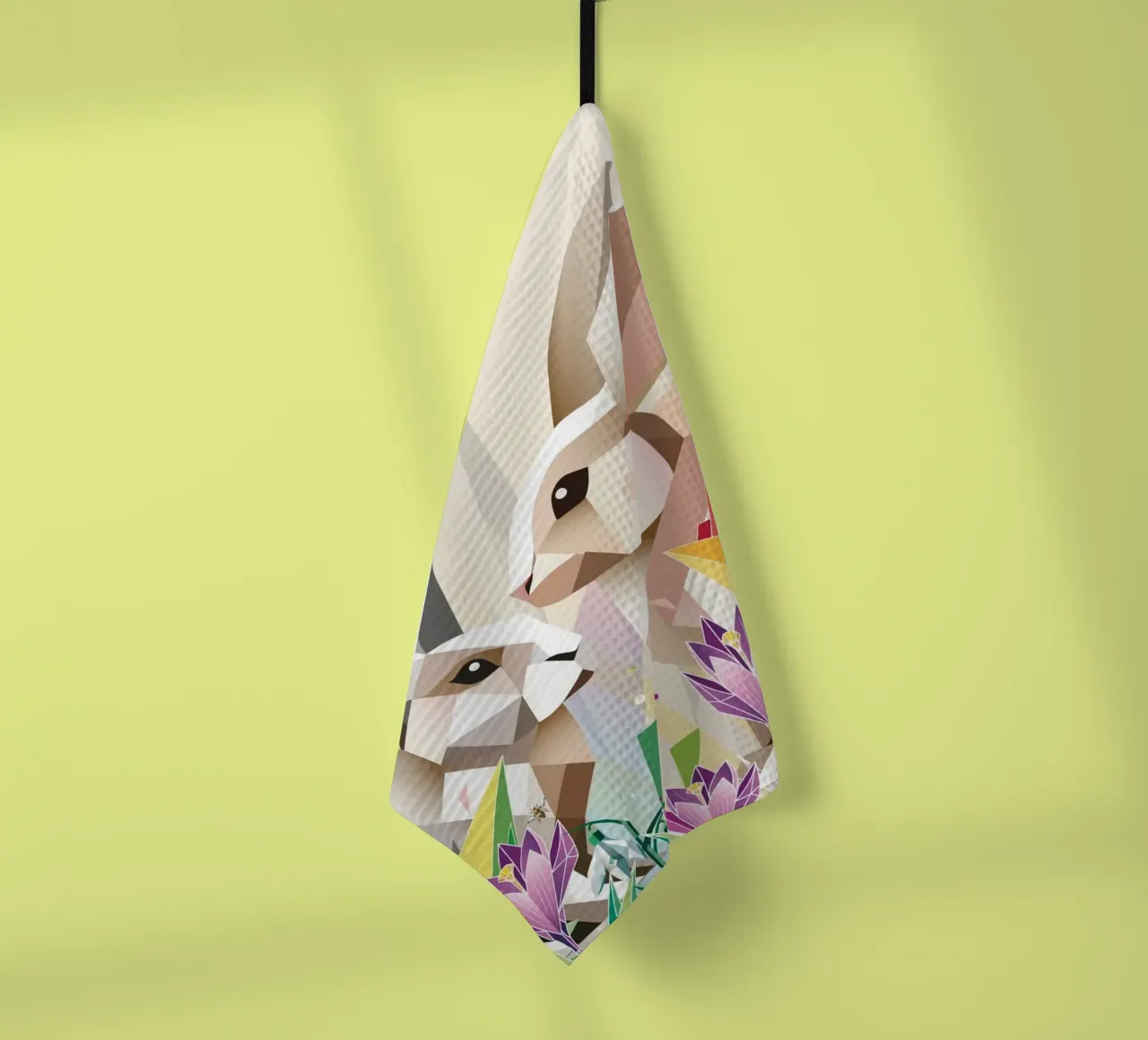 Dos conejos de Pascua en un mar de flores paño de cocina de namosh
