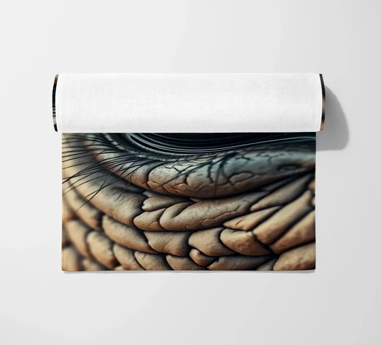 Close-up of an elephant's eye revealing intricate details beach towel by DesignDoodle