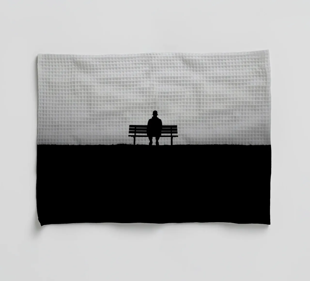 Un personnage solitaire assis sur un banc, triste et solitaire torchon de DesignDoodle