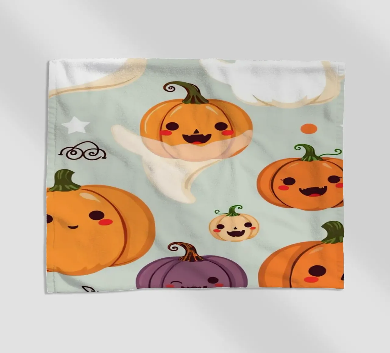 Simpatica illustrazione a tema Halloween con zucca sorridente telo mare da DesignDoodle