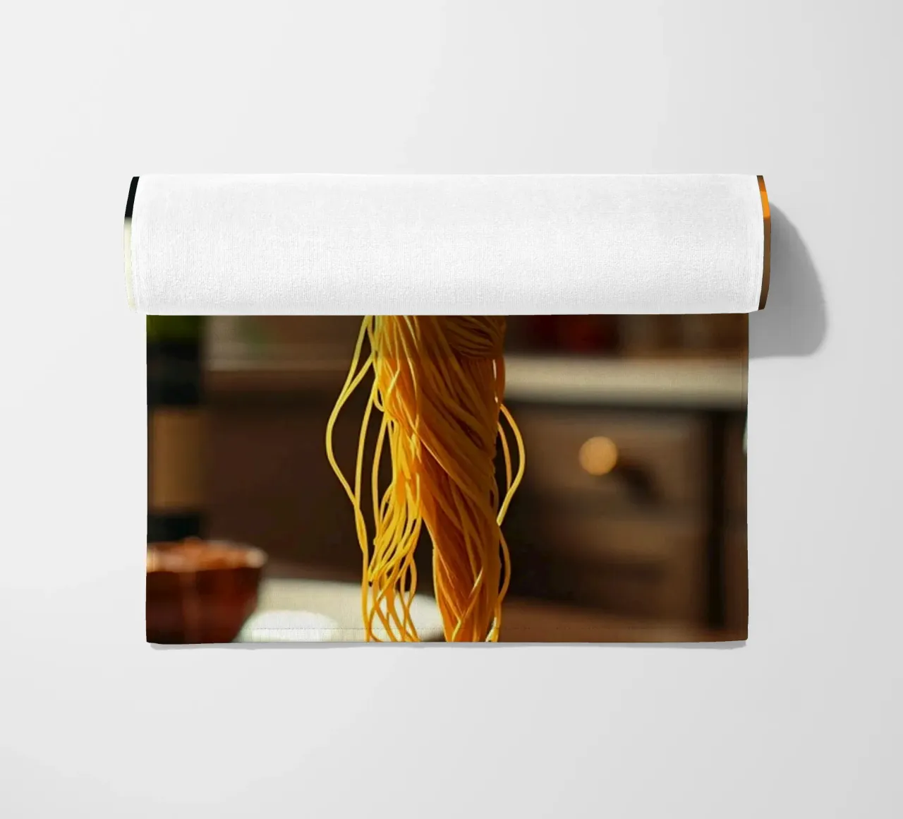 Una scultura di pasta si trova su un piatto in un accogliente tavolo da cucina telo mare da DesignDoodle