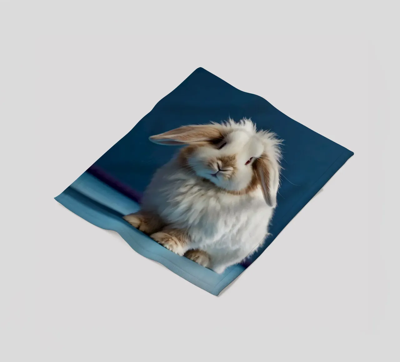 Flauschiges weißes Kaninchen, das auf einer blauen Fläche sitzt Fleecedecke von DesignDoodle
