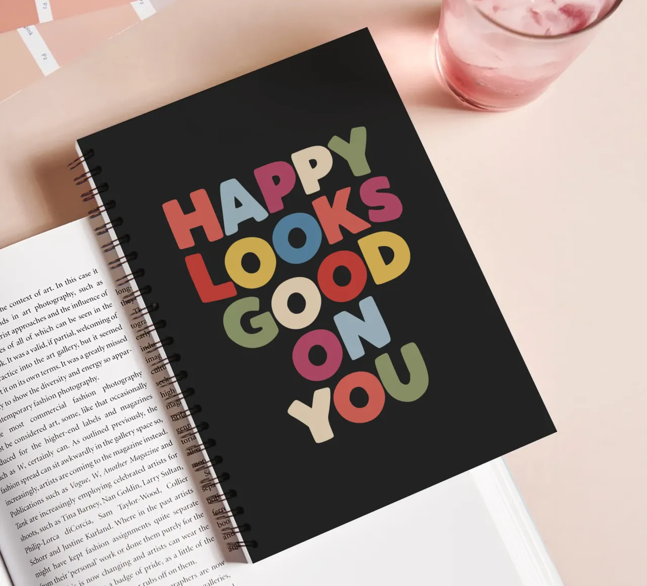 Happy Looks Good on You Vibrant Colourful Cheerful Lettering spiral notebook by THE MOTIVATED TYPE