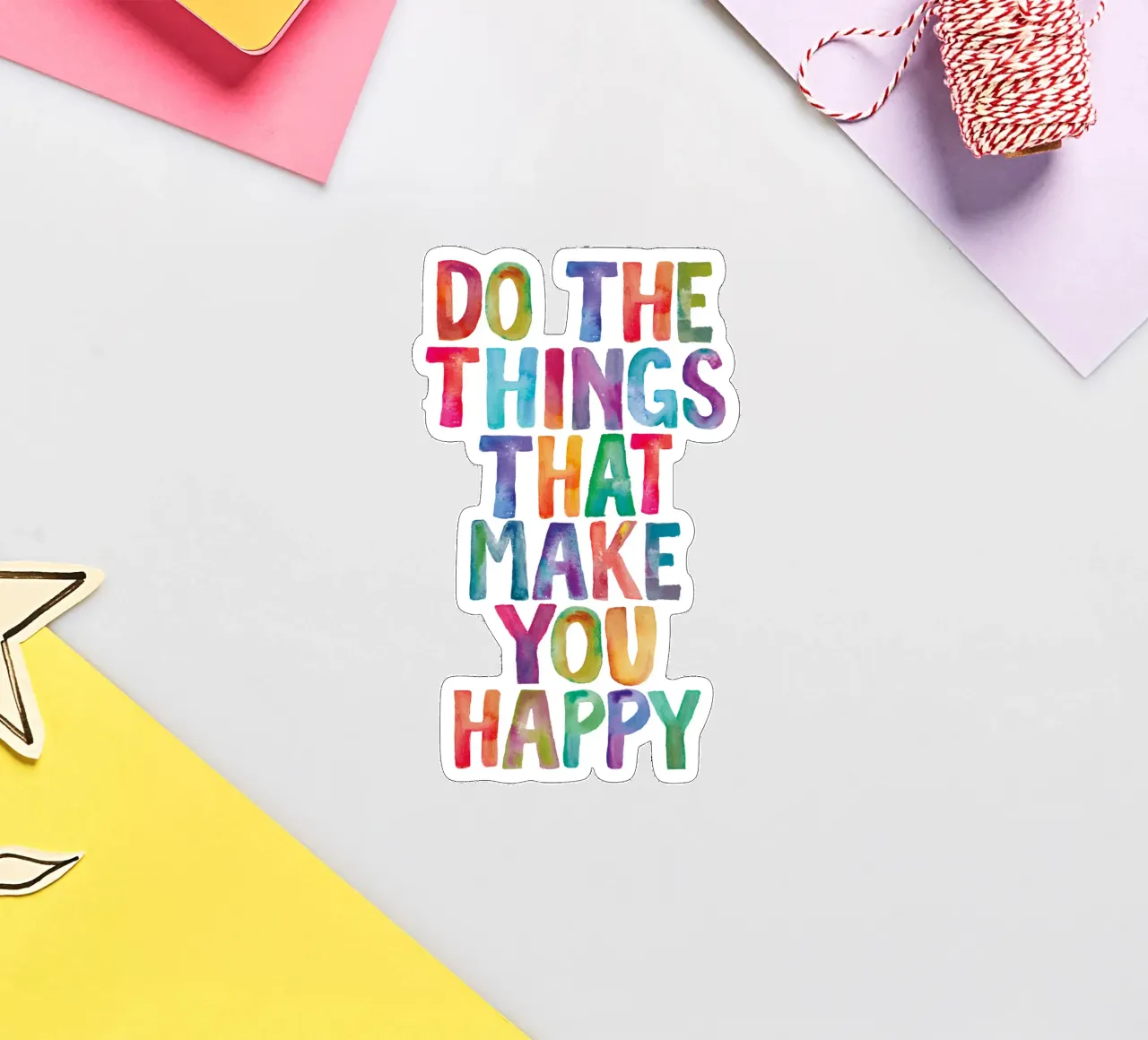 Fai le cose che ti rendono felice Tipo acquerello arcobaleno adesivo da THE MOTIVATED TYPE