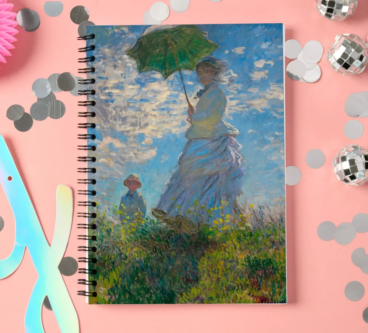 holding an umbrella over a child - Monet spiral notebook by Perdana shop