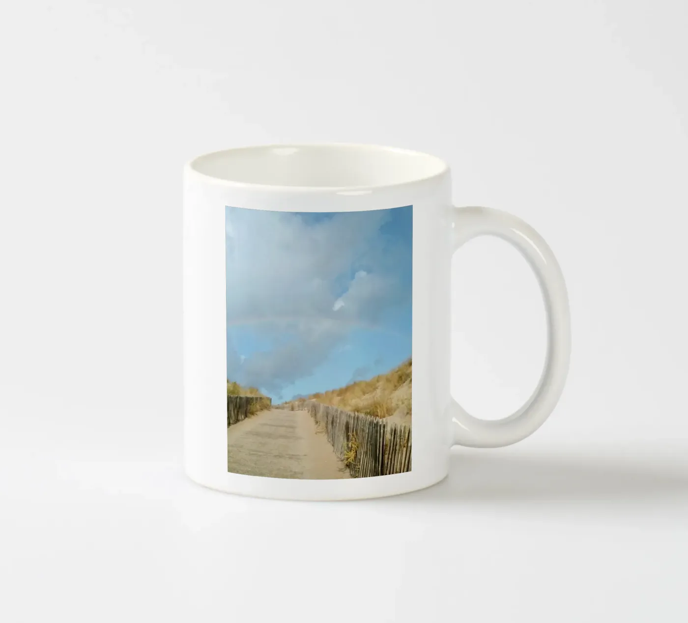Rainbow ceramic mug by Kreativernetzt