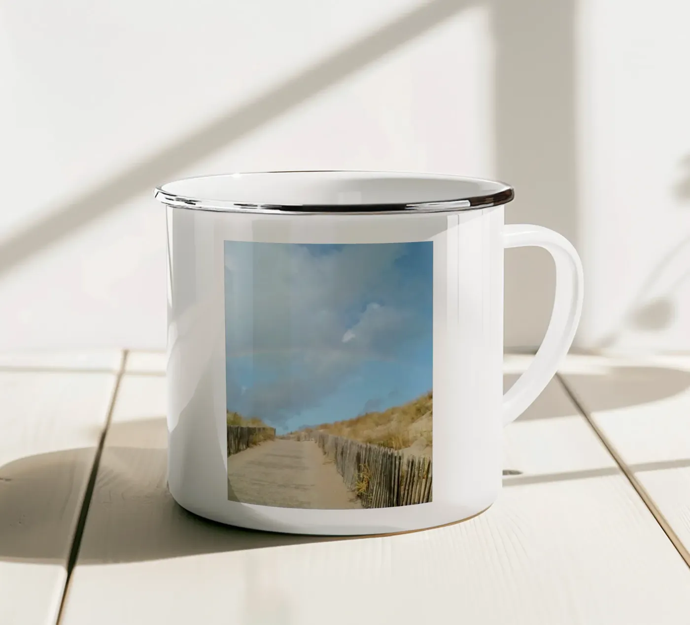Rainbow enamel mug by Kreativernetzt