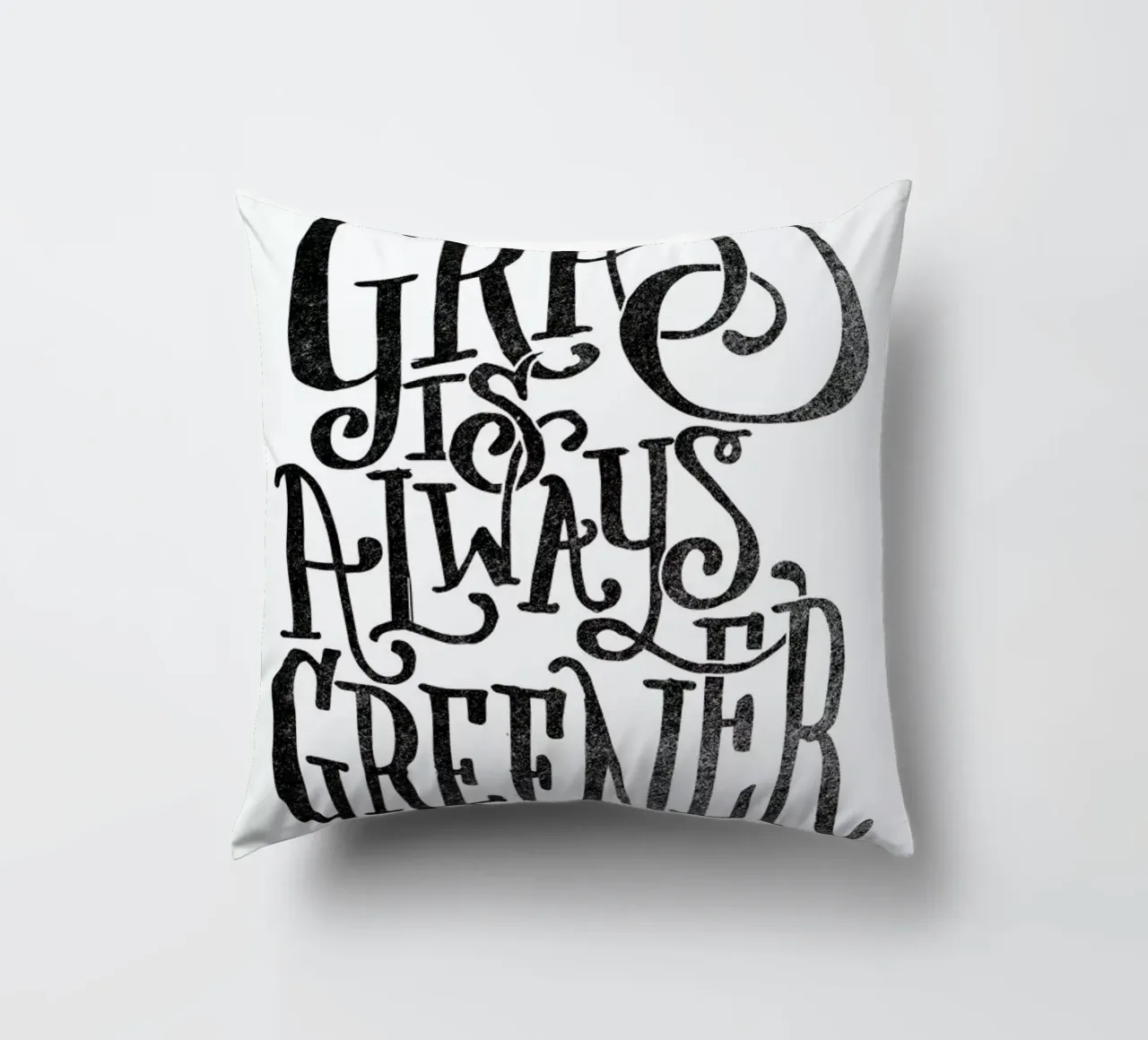 the grass is always greener cojín de Matthew Taylor Wilson