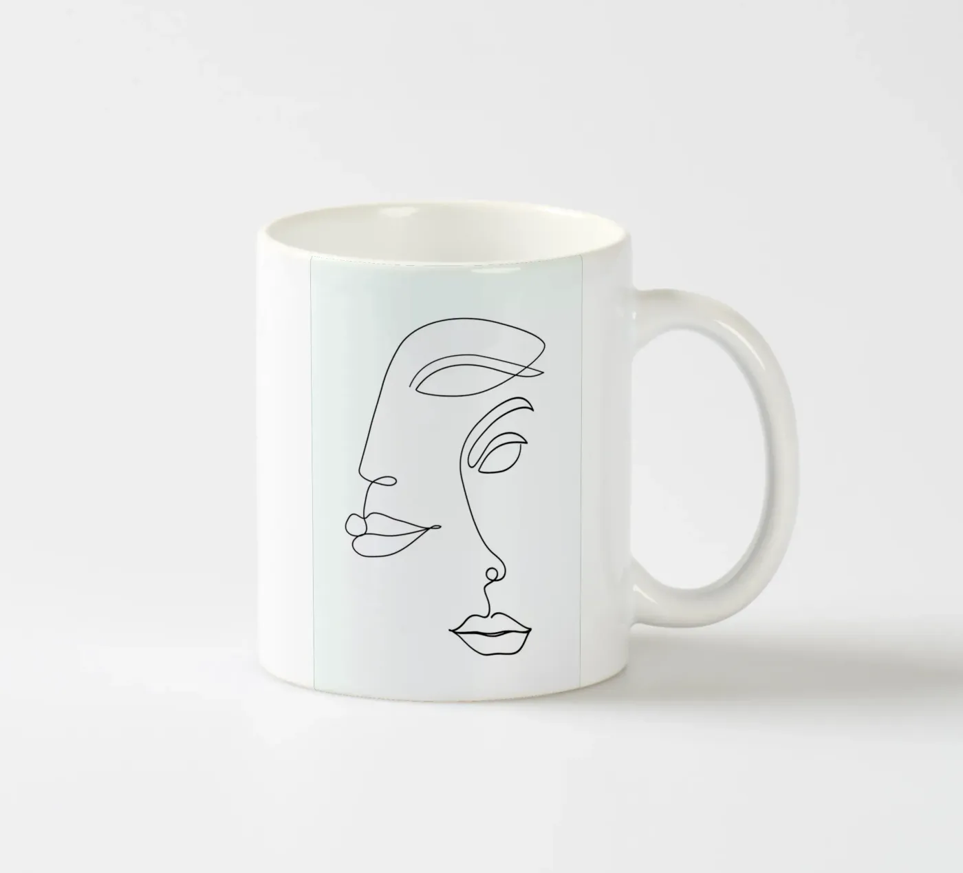 Two Faced ceramic mug by Honeymoon Hotel