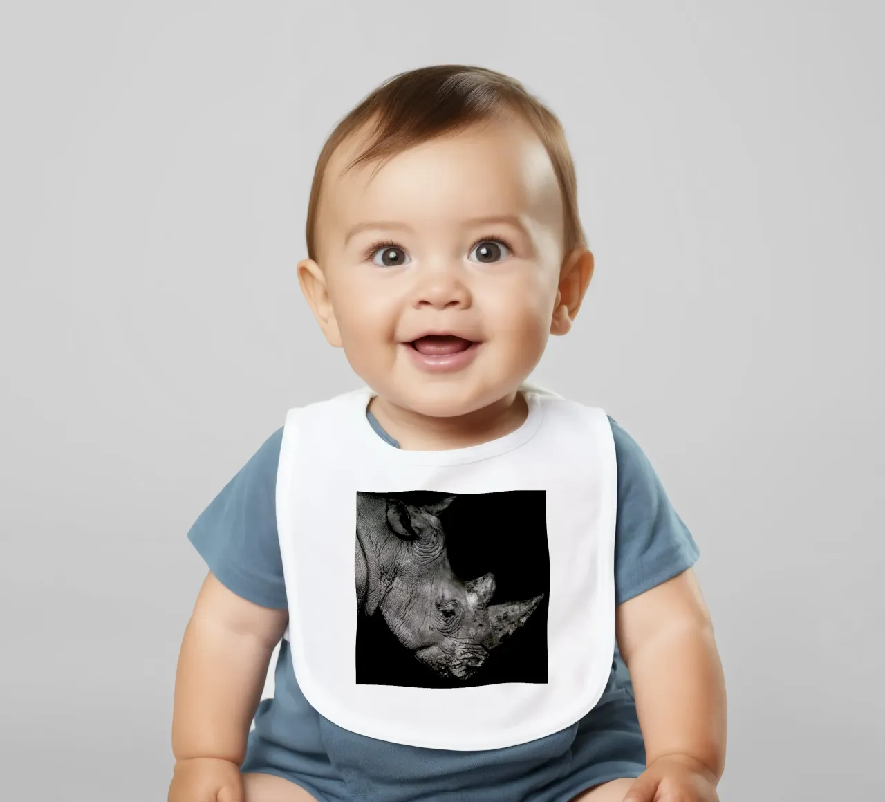 Rhino Profile by Lothare Dambreville baby bib by EyeEm Mobile GmbH