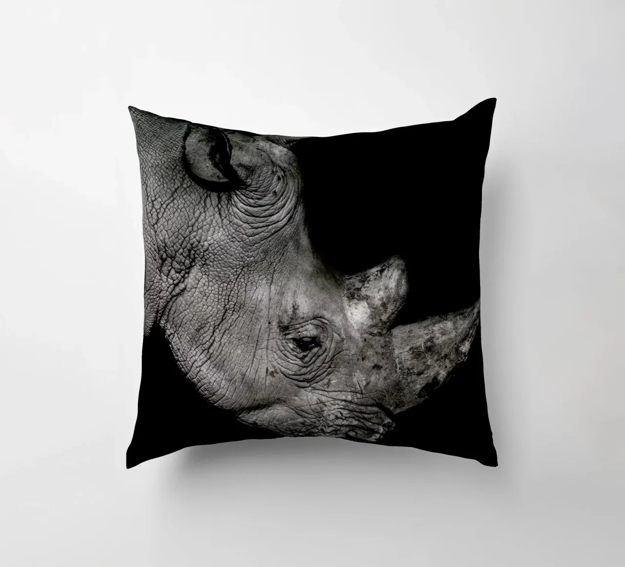Rhino Profile by Lothare Dambreville decorative cushion by EyeEm Mobile GmbH