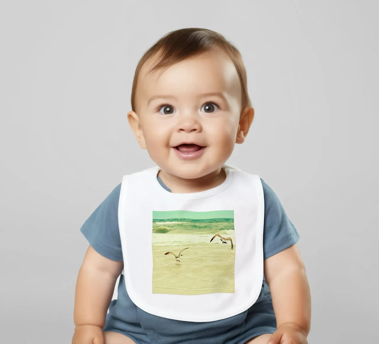 Karatekidpose baby bib by Robin Delean