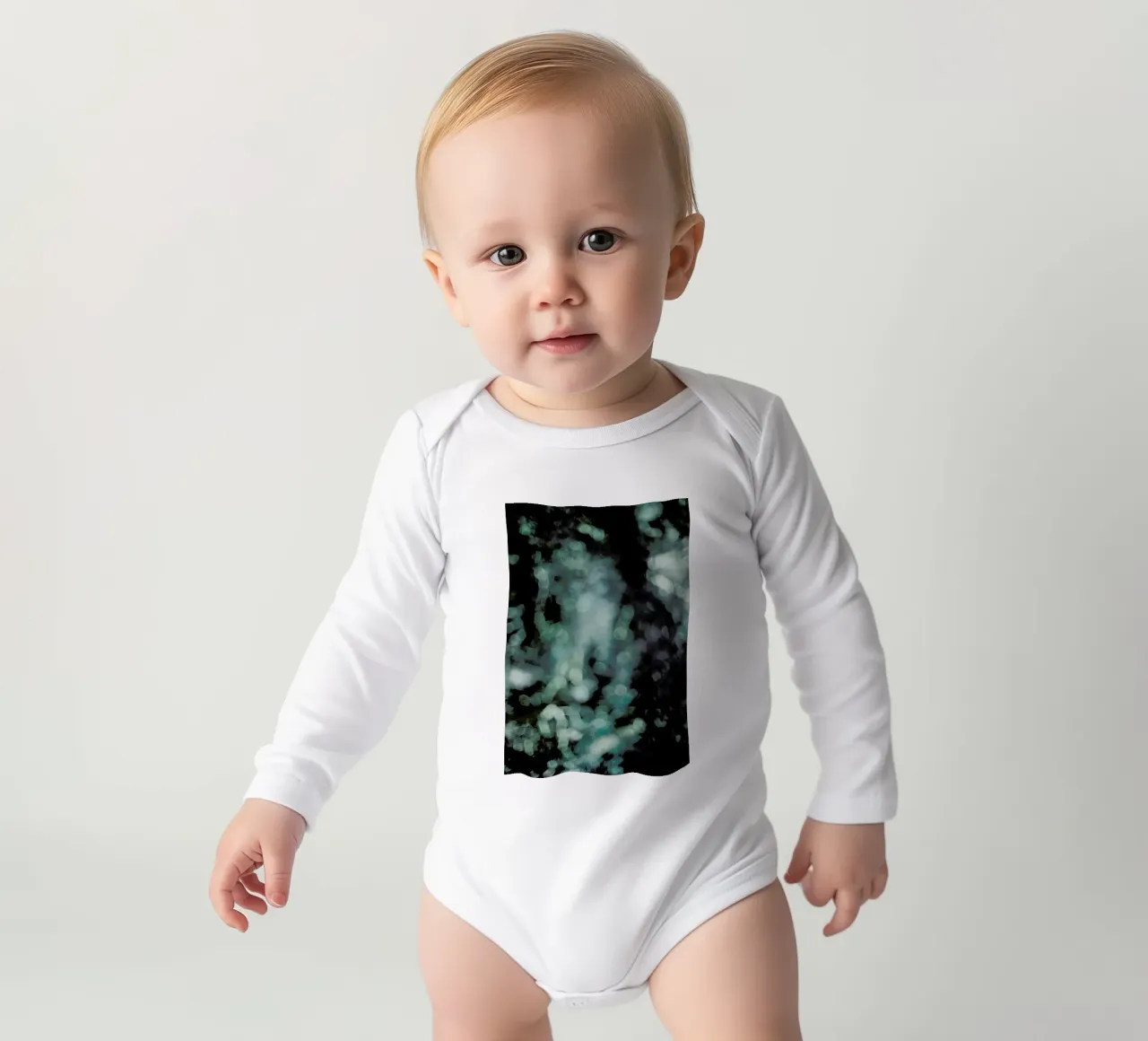Twinkle long-sleeve baby romper by Shot By Clint