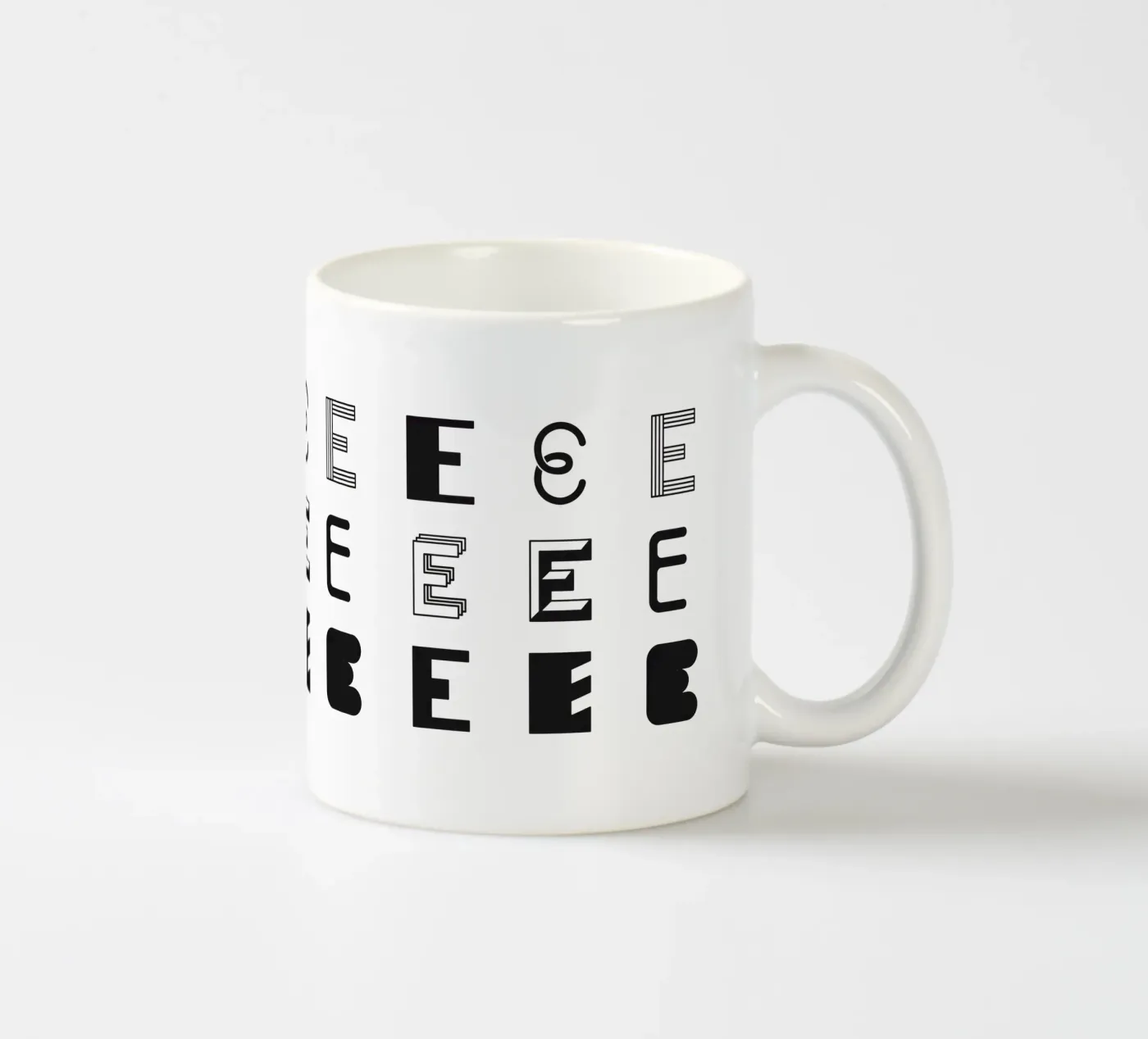 Letter E ceramic mug by Lidia Blomgren