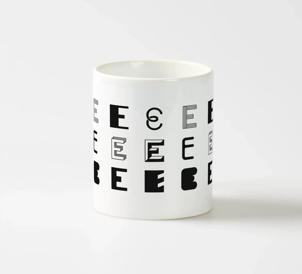 Letter E ceramic mug by Lidia Blomgren