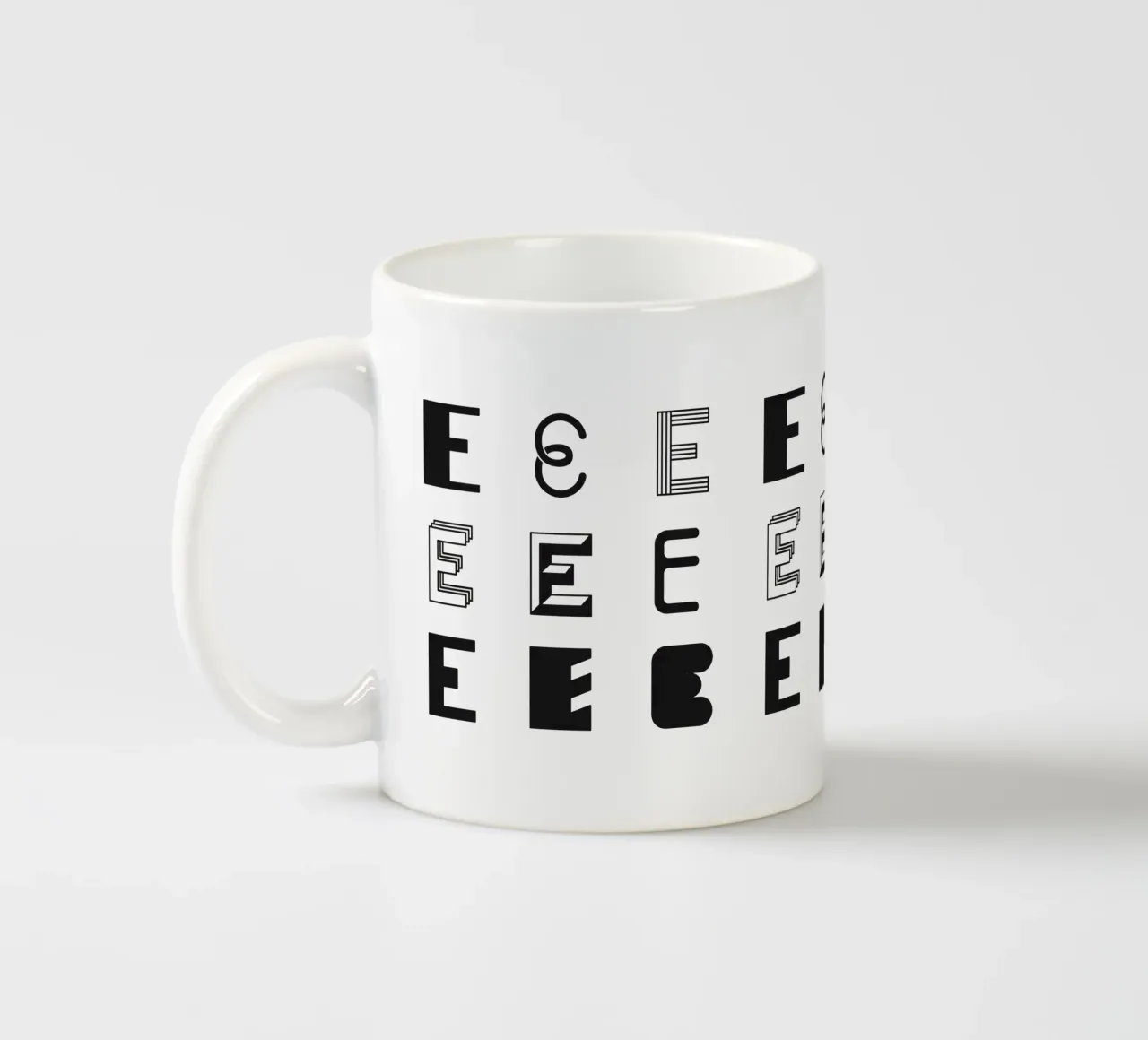Letter E ceramic mug by Lidia Blomgren