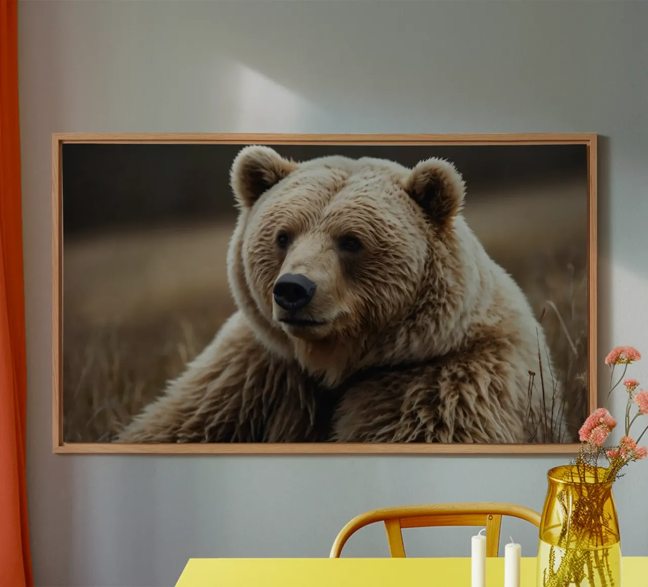 A close-up view of a brown bear resting in a grassy field alu-dibond by DesignDoodle
