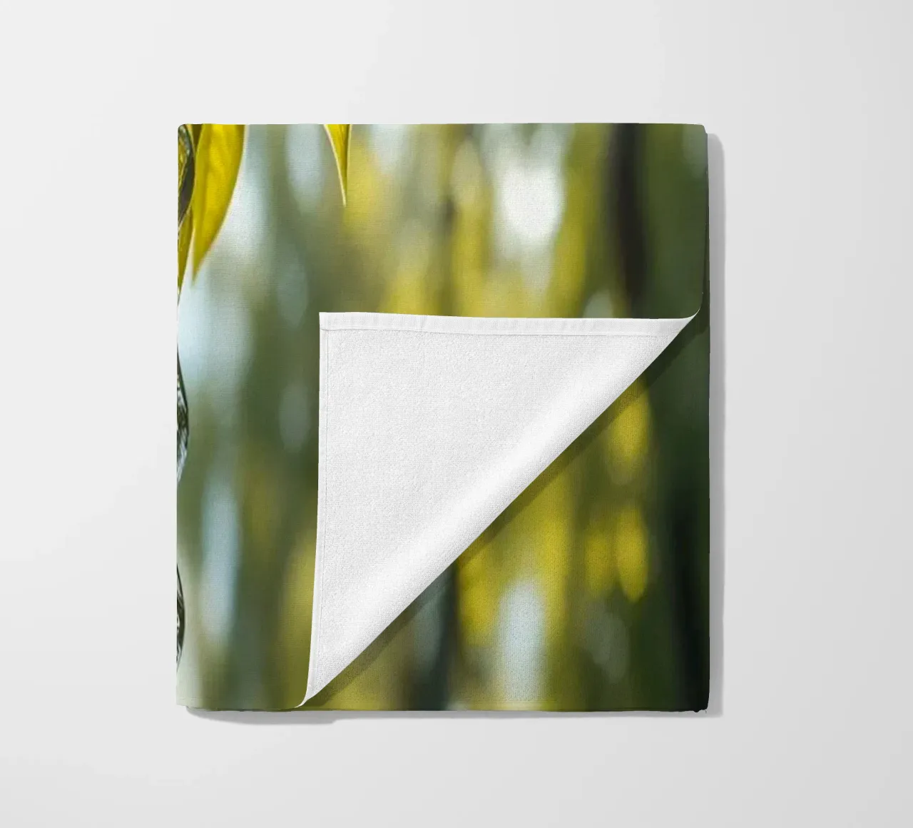 Water Dropping from a Leafs in forest beach towel by DesignDoodle