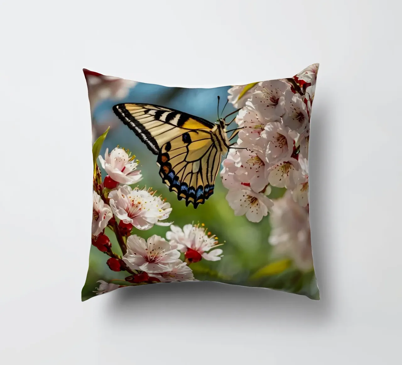 Una farfalla si posa delicatamente sui fiori sbocciati cuscino da DesignDoodle