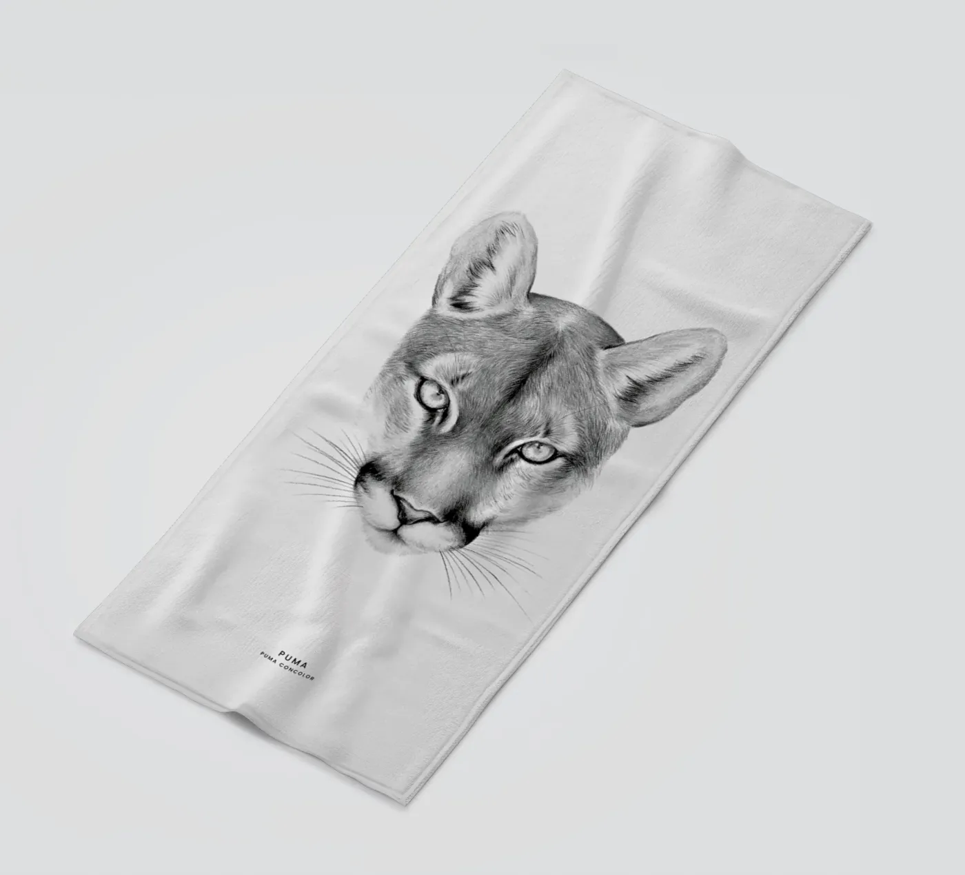 Puma beach towel by Flora & Fauna