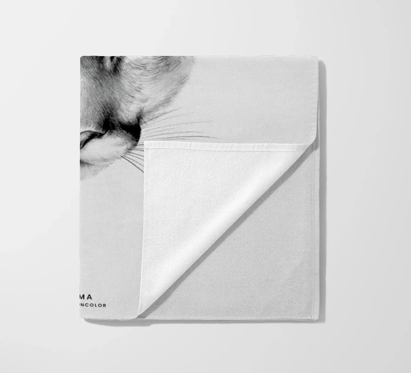 Puma beach towel by Flora & Fauna