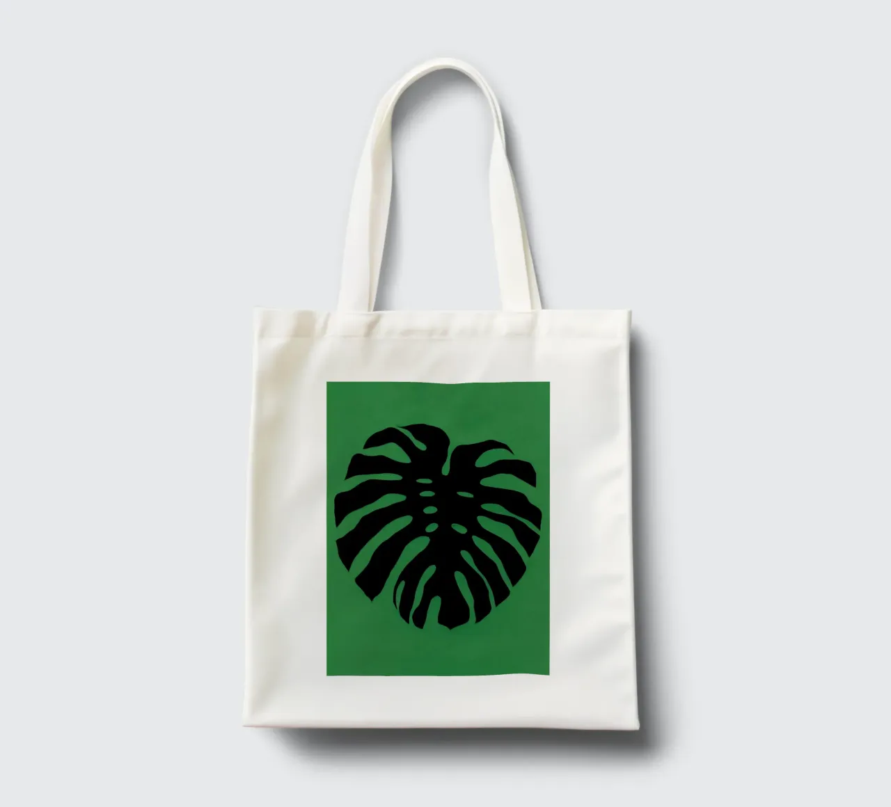 Black Monstera tote bag by Rosi Feist