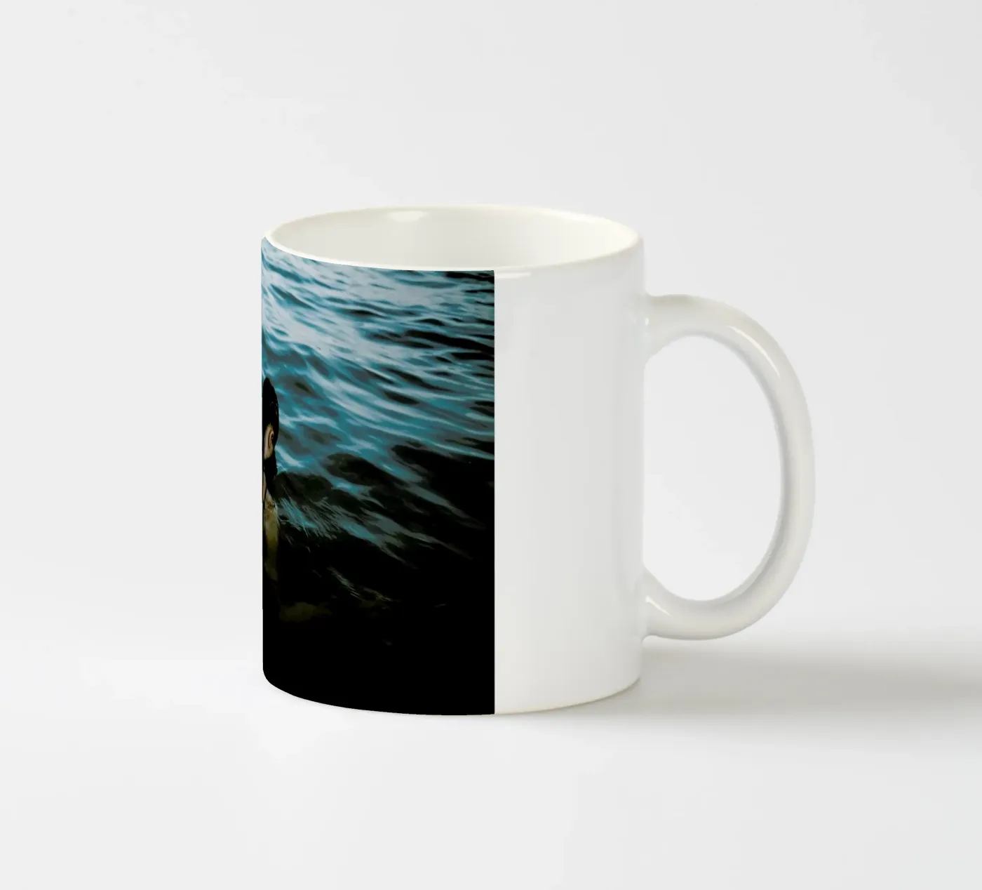 Drowning ceramic mug by Chris Abatzis
