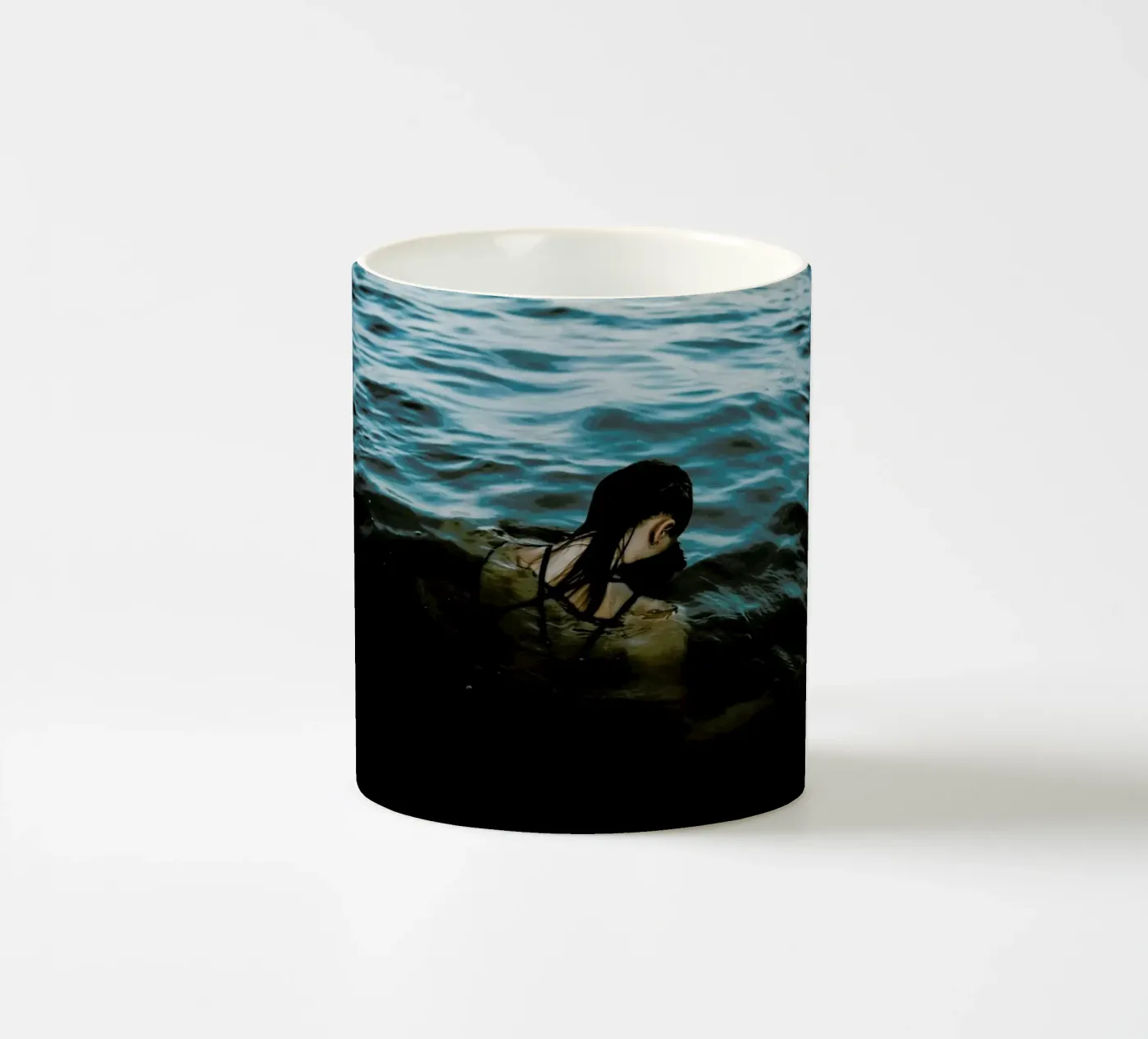 Drowning ceramic mug by Chris Abatzis
