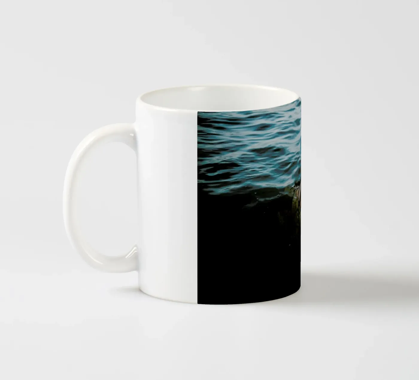 Drowning ceramic mug by Chris Abatzis