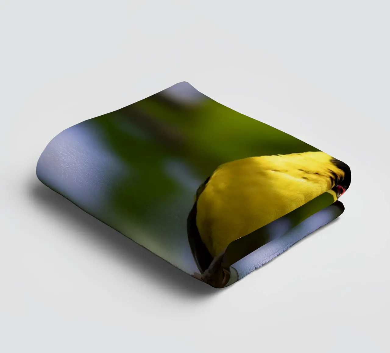 Yellow Bird perched on a branch towel by Léa Lefebvre Photography