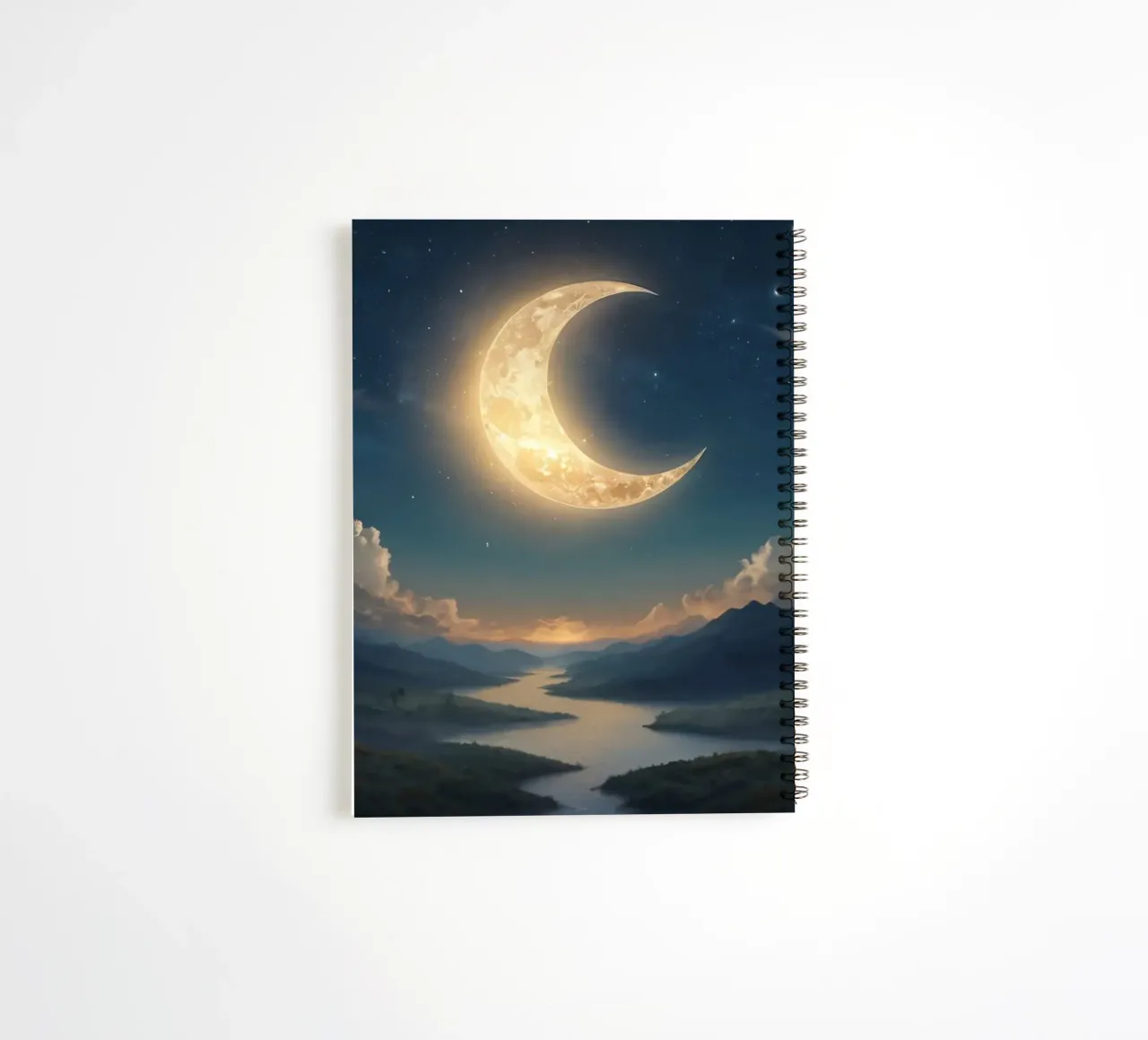 A tranquil evening with a luminous crescent moon illuminatin spiral notebook by DesignDoodle