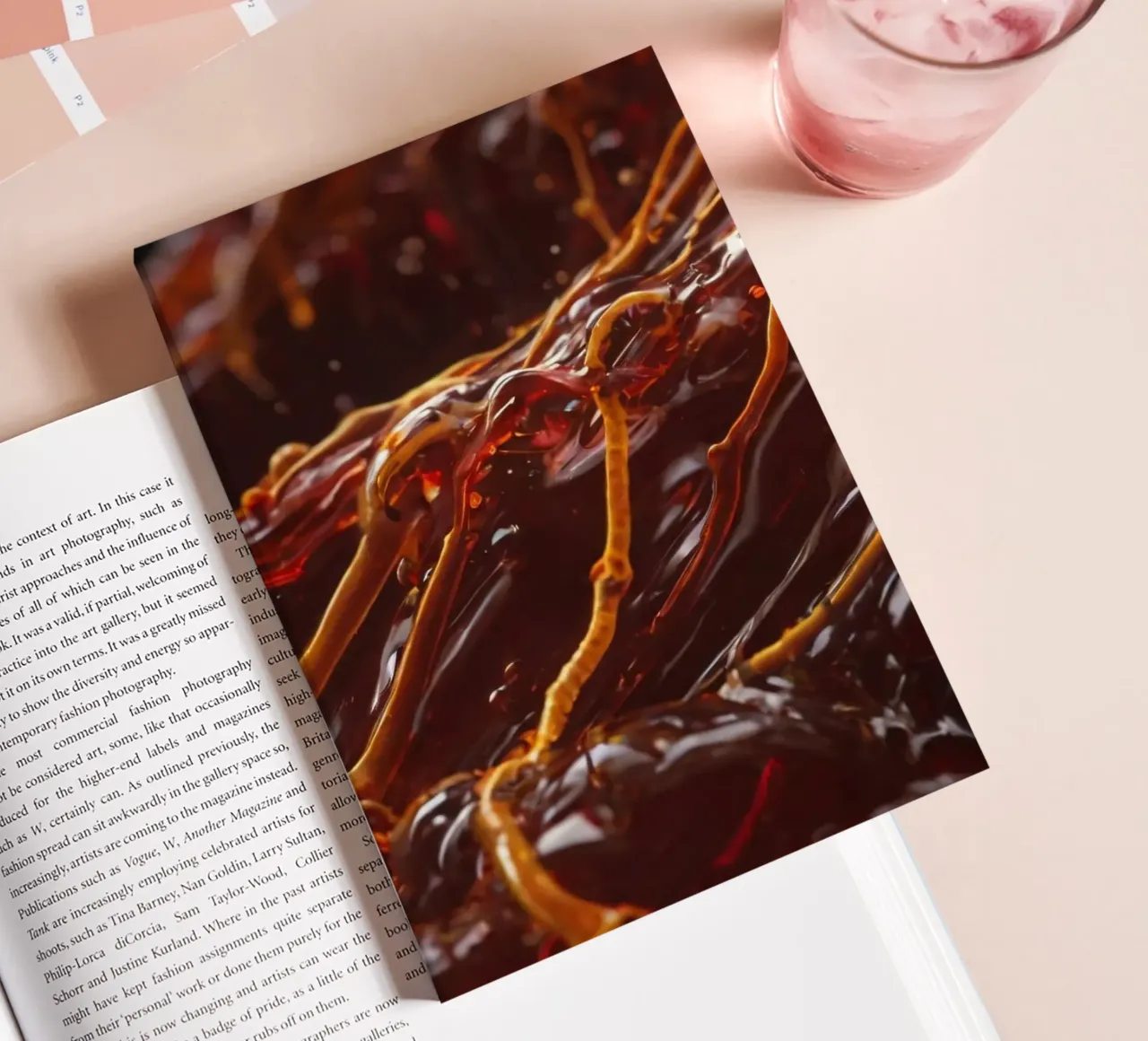 Fluid dynamics captured in orange and red layers notebook by DesignDoodle