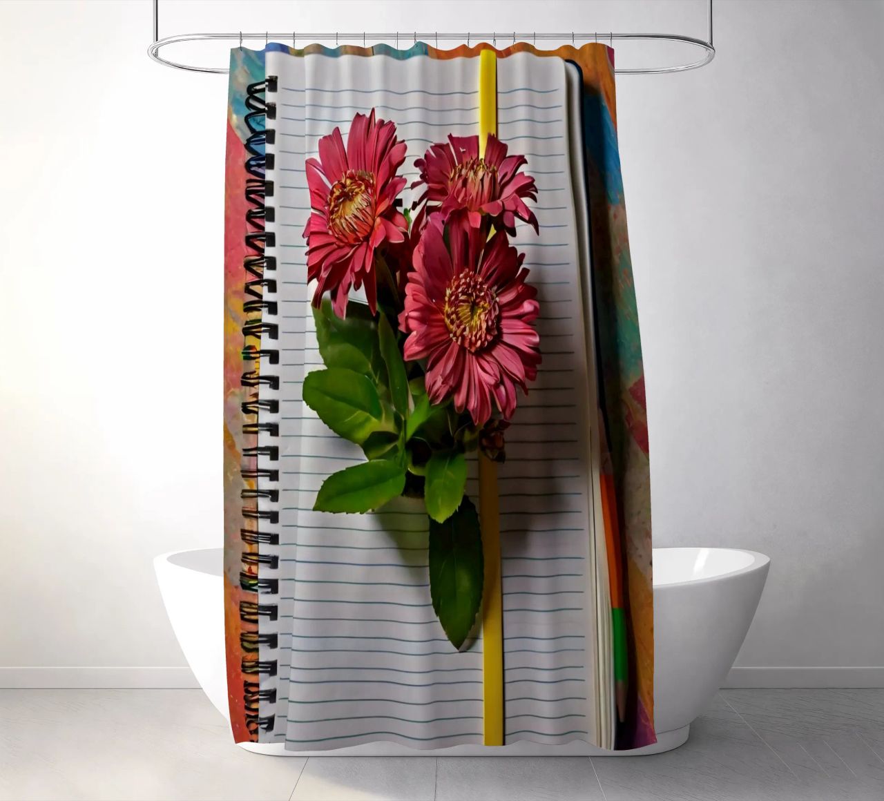 Un taccuino vivace con fiori rosa appoggiati in cima, che mette in mostra tenda da doccia da DesignDoodle
