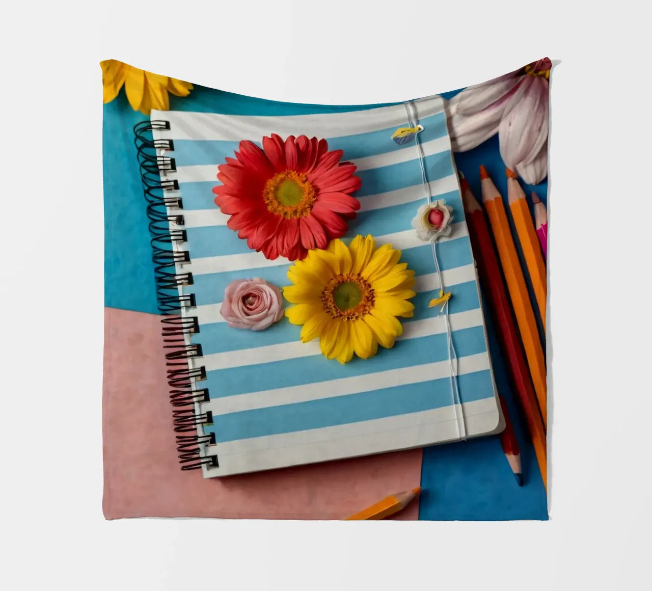 Colorful notebook adorned with flowers surrounded by pencils fleece blanket by DesignDoodle