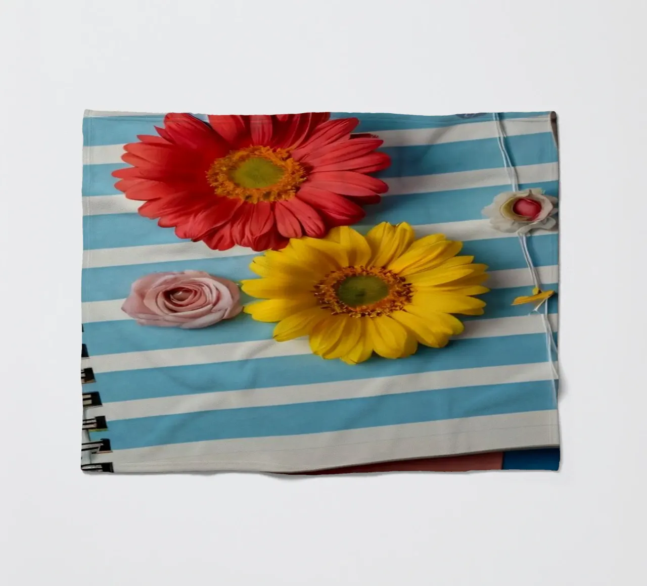 Colorful notebook adorned with flowers surrounded by pencils fleece blanket by DesignDoodle