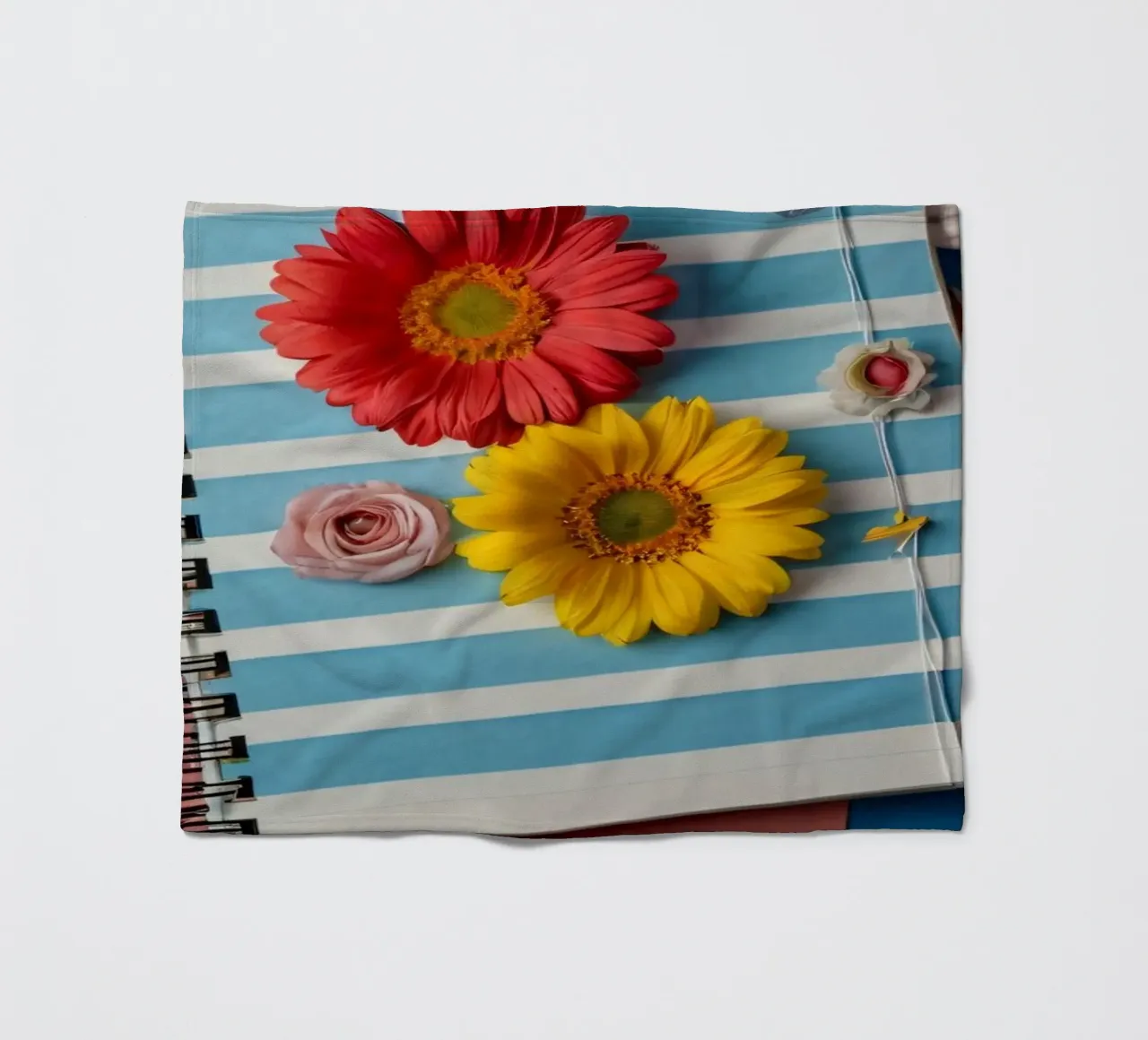 Colorful notebook adorned with flowers surrounded by pencils fleece blanket by DesignDoodle