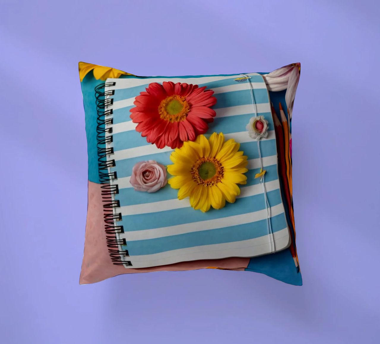 Taccuino colorato ornato di fiori e circondato da matite cuscino da DesignDoodle