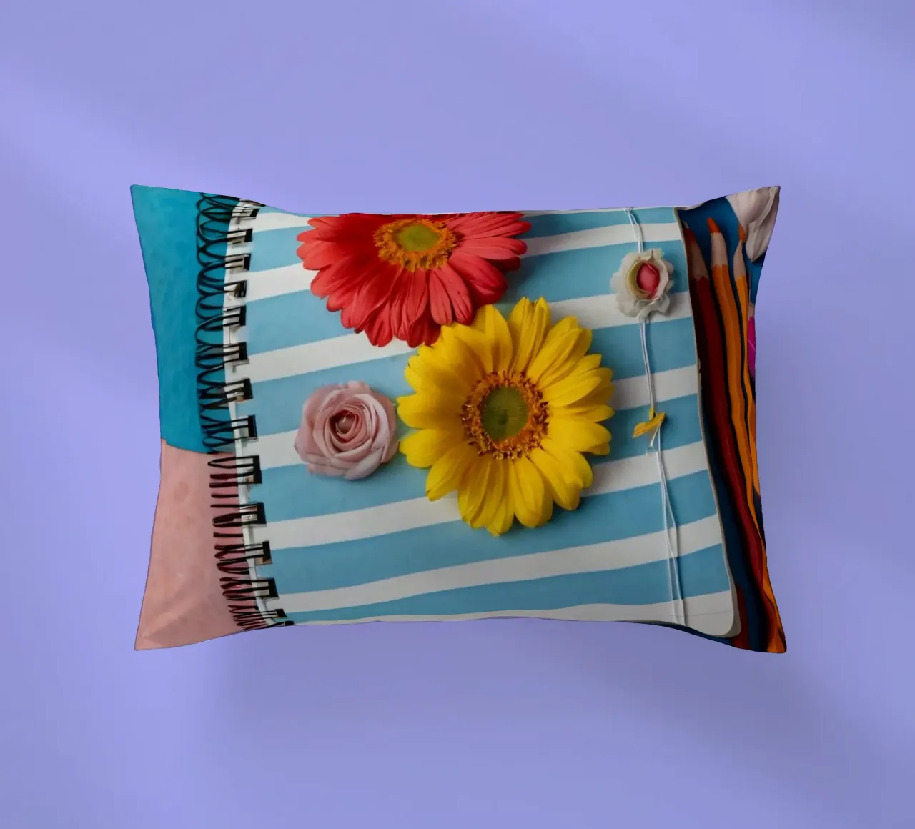 Taccuino colorato ornato di fiori e circondato da matite cuscino da DesignDoodle
