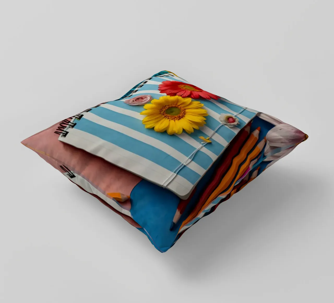 Taccuino colorato ornato di fiori e circondato da matite cuscino da DesignDoodle