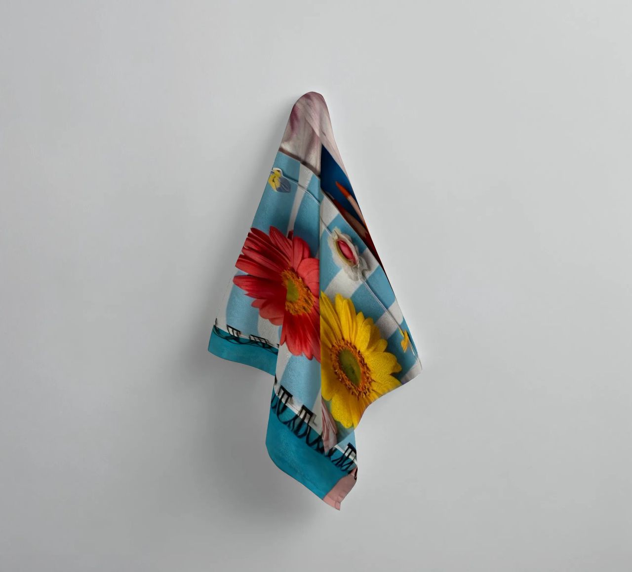 Colorful notebook adorned with flowers surrounded by pencils towel by DesignDoodle