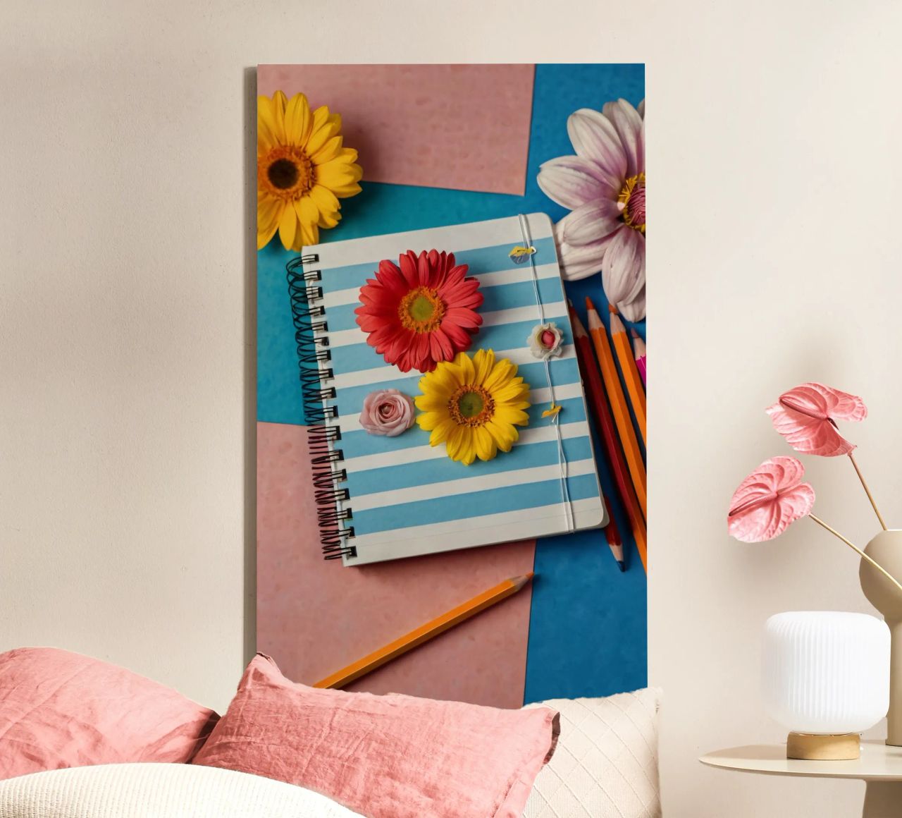 Colorful notebook adorned with flowers surrounded by pencils canvas by DesignDoodle